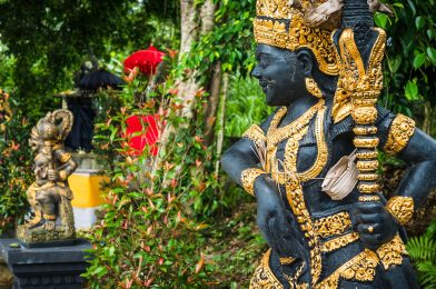 Bali temple entrance with guardian statue